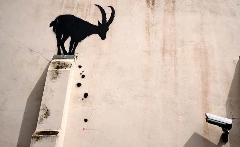 Banksy Strikes Again: New Artwork Depicts Goat on Precipice in British Kew Green