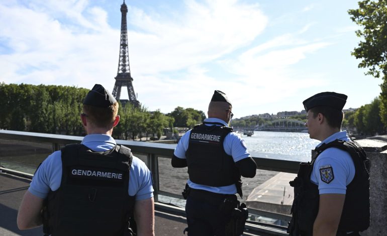 Eiffel Tower Evacuated After Man Scales Structure Ahead of Olympics Closing Ceremony