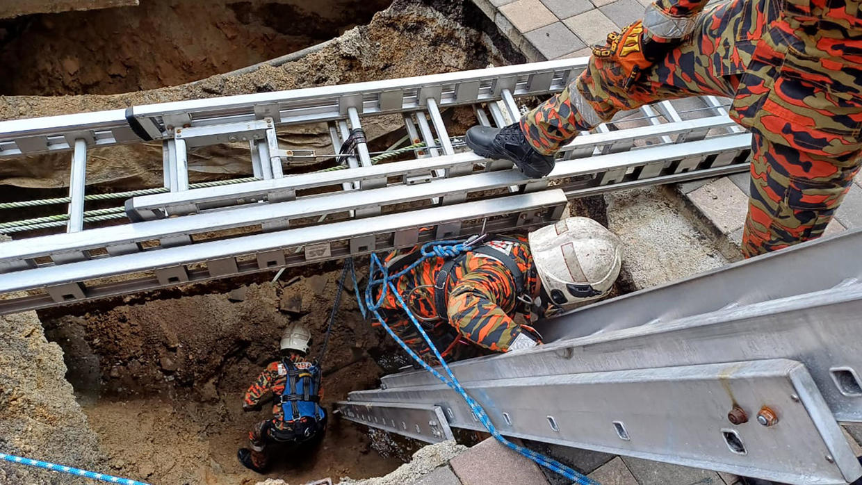 Woman Falls into 26-Foot Sinkhole in Malaysia’s Kuala Lumpur