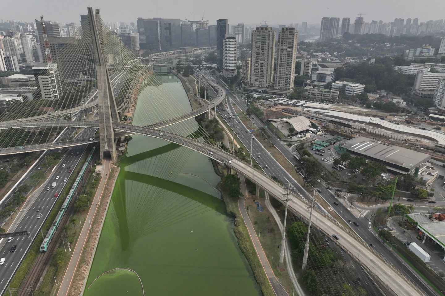 Drought and Wildfires Turn Sao Paulo’s River Green and Skies Grey