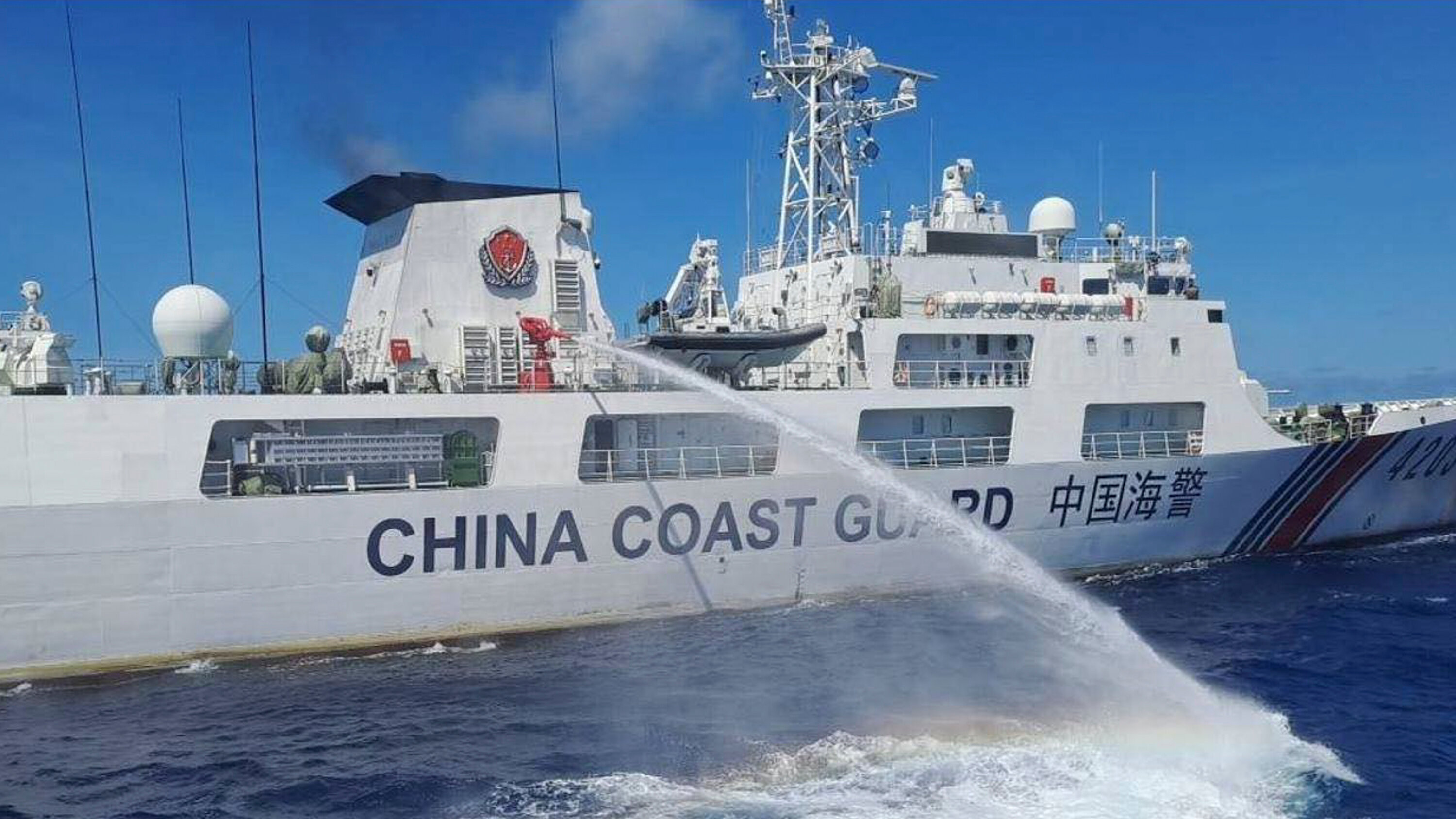 Chinese Coast Guard Fires Water Cannons at Philippine Boats in South China Sea