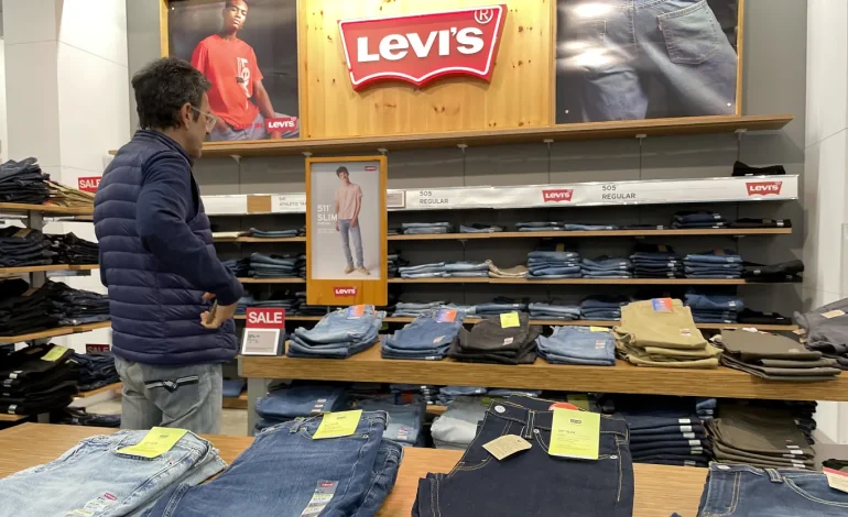 Levi Strauss Lowers Revenue Forecast, Considers Sale of Dockers Business