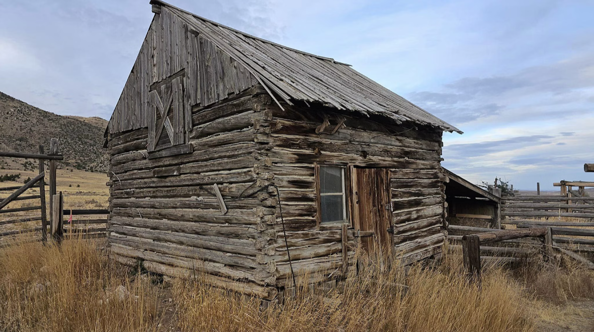 Historic Cabin with Possible Ties to “Wyoming Atlantis” Up for Sale by Cody Couple