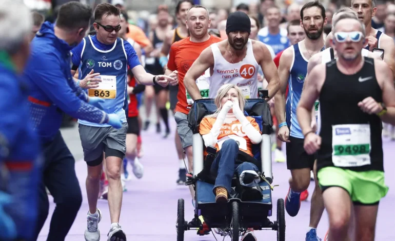 Colin Farrell Pushes Friend in Wheelchair to Finish Dublin Marathon, Raises Funds for Rare Skin Condition Charity