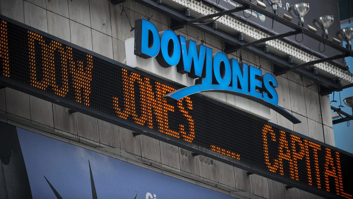 Dow Jones Falls 1,100 Points as Fed Outlook and Earnings Weigh on Markets, Tesla and Micron Struggle